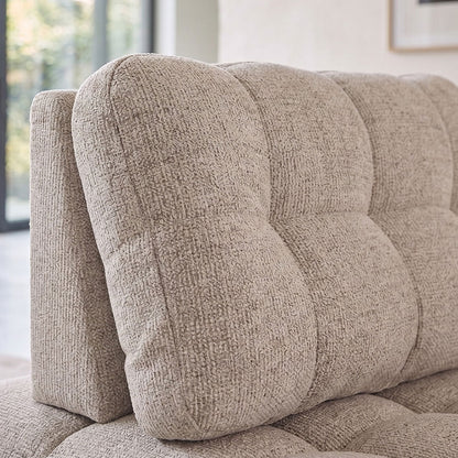 Flow – poltrona imbottita in bouclé con seduta regolabile